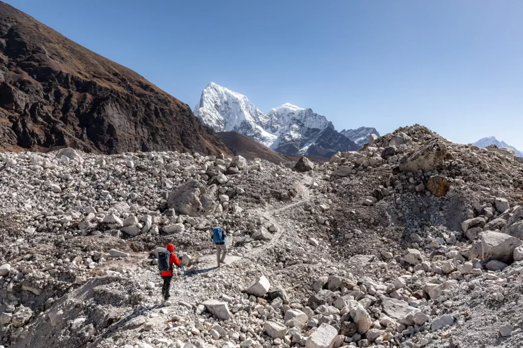 Hikers crossing Ngozumpa glacier